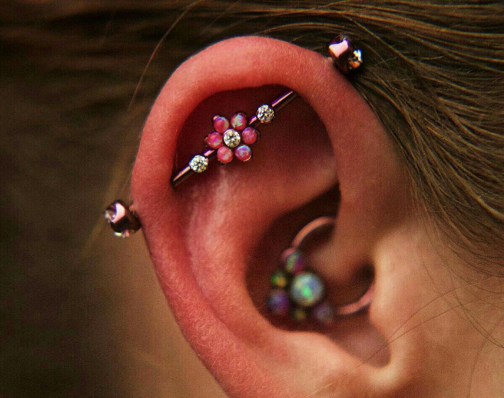 Woman with industrial piercing, close-up