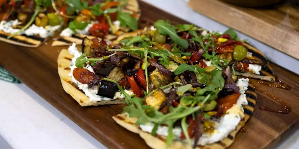 Flatbread with roasted vegetables and herbed goat cheese